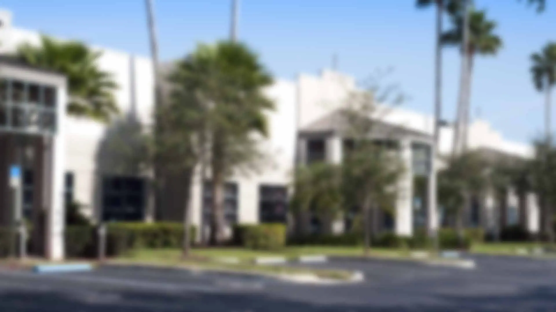 Commercial space in Spring Hill, FL receiving landscape maintenance services.