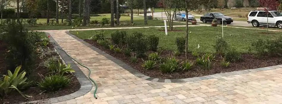 Customers, like this resident in Spring Hill, FL, can opt to have TLB Landscaping design and install custom walkways and other hardscape elements.